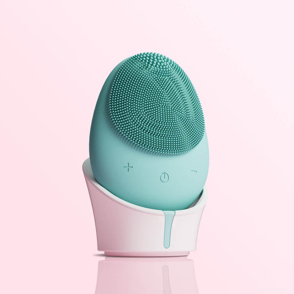 Fancii Isla sonic facial scrubber for women in hand in colour Aqua by Fancii  & Co.