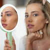 Cami handheld makeup vanity mirror features 3 dimmable led light by Fancii and Co All