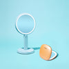 Vacay Glow Duo with the Cami Handheld and Mila compact in Blue Fluff Sunset Peach