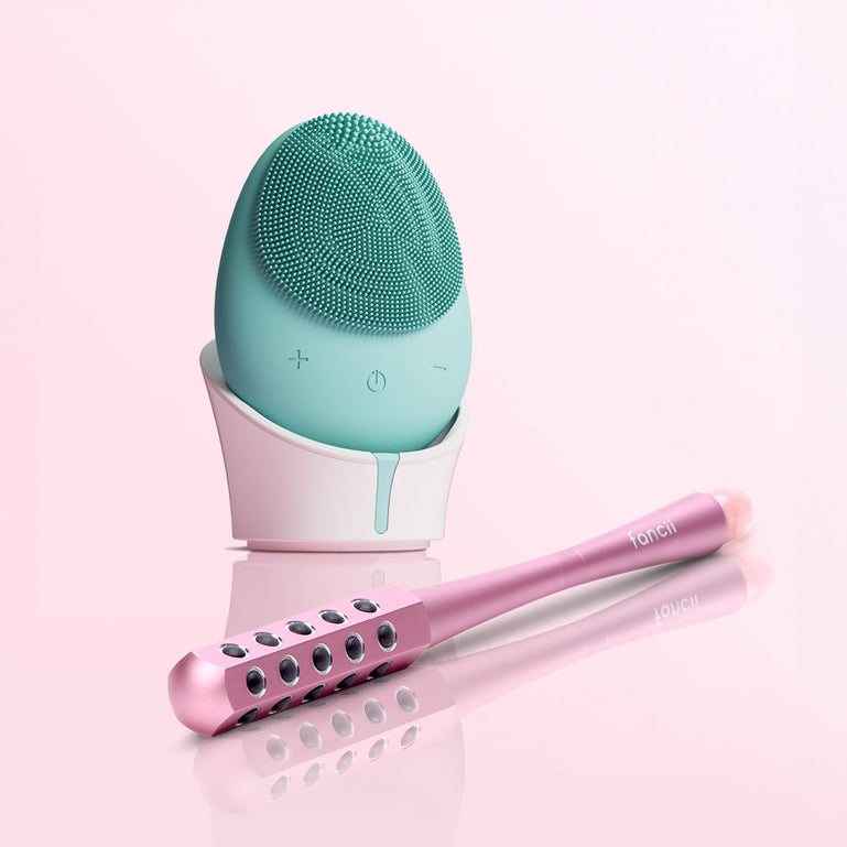 Daily essentials Isla sonic facial cleansing brush and Remi facial massager tool by Fancii and Co Aqua Pink