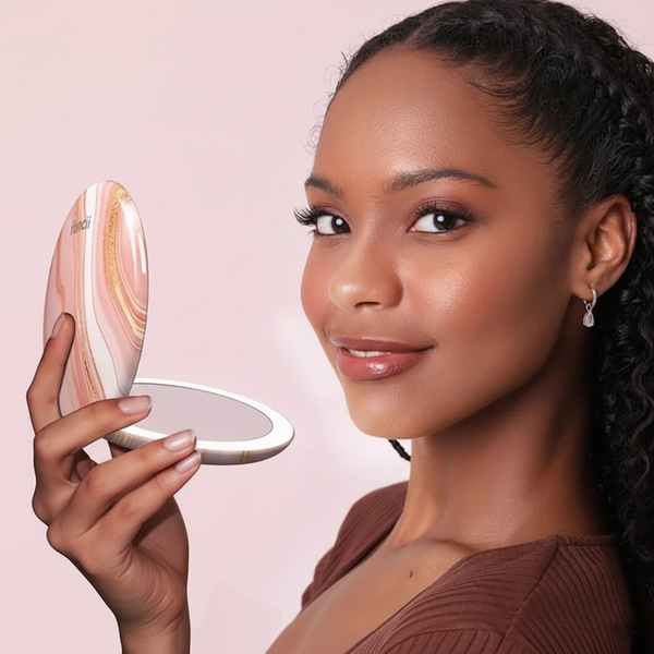 Taylor Lighted Compact  with 10x magnification held open by model by Fancii & Co. MARBLE ROSÈ