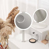 Tara suction mirror by Fancii & Co. in on a clean desk White Black