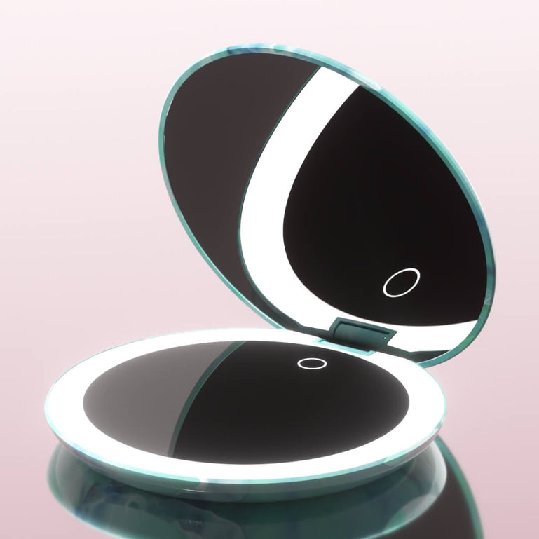 Taylor Compact Mirror by Fancii and Co open and lit up in SEA SERENITY
