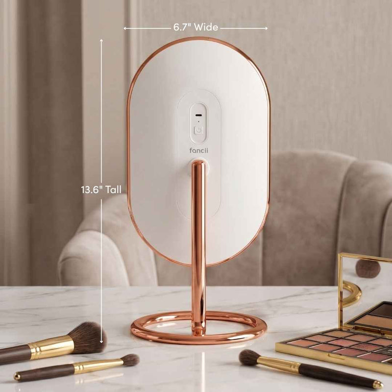 Abigail with Tara Travel Vanity Mirror by Fancii & Co. with 10x Magnifier showing precision details
