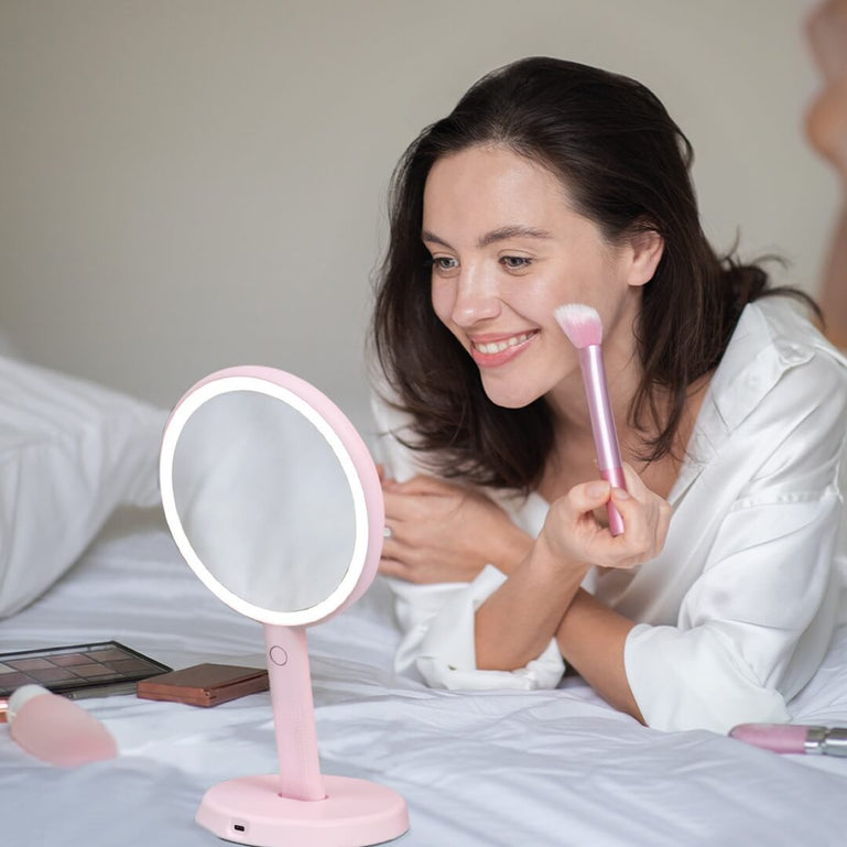 Cami handheld makeup vanity mirror features 3 dimmable led light by Fancii and Co All