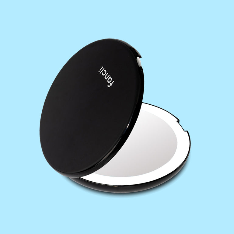 Mini Lumi lighted compact mirror with 1x/10x magnifying by Fancii and Co in_Midnight Black