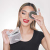 Female with Zoe EYE makeup remover pads with laundry mesh bag